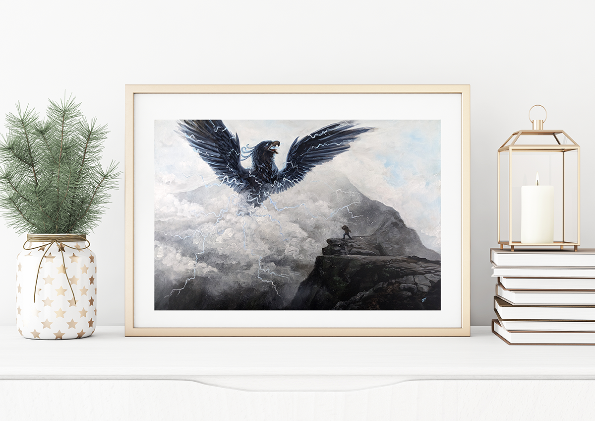 A framed painting print titled 'Pamola Peak' depicting the pamola in flight with a mountainous background, displayed on a wall shelf.